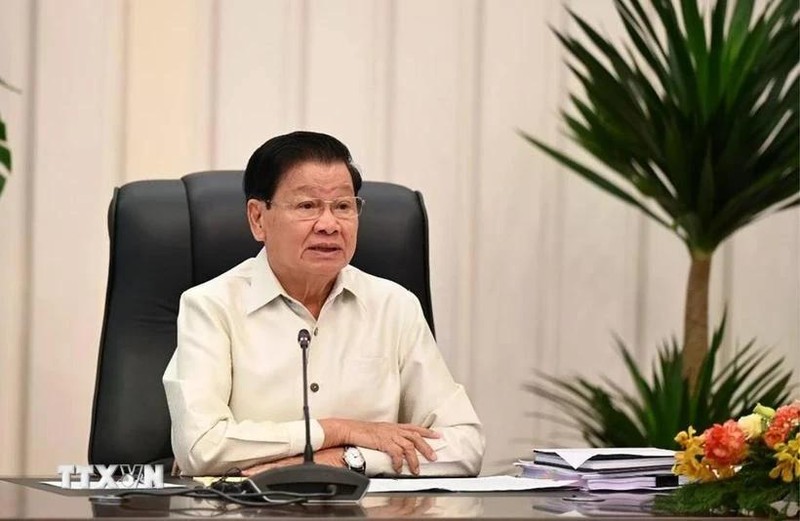 老挝人民革命党中央总书记、老挝国家主席通伦·西苏里在纪念活动上致辞。（图片来源：越通社）