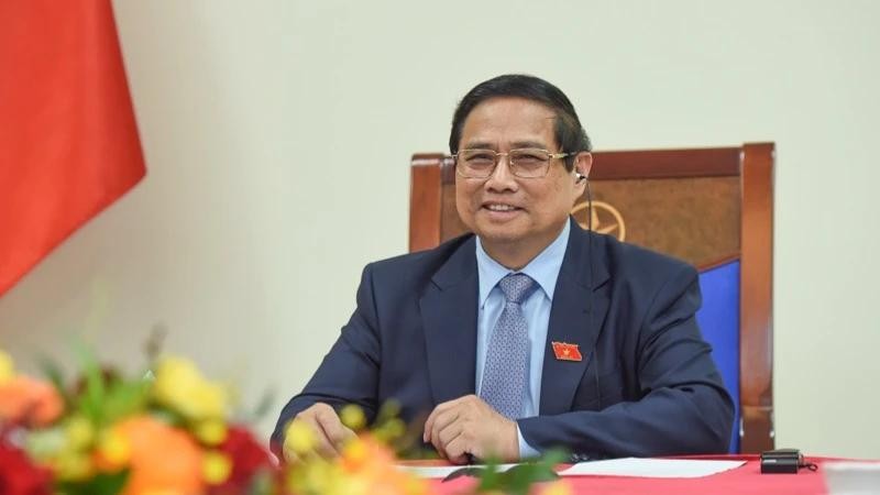 越南政府总理范明正与澳大利亚总理安东尼·阿尔巴尼斯通电话。（陈海 摄）