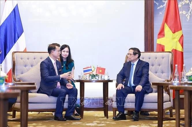 范明正总理会见开泰银行董事长钟拉·拉塔纳皮安。（图片来源：越通社）