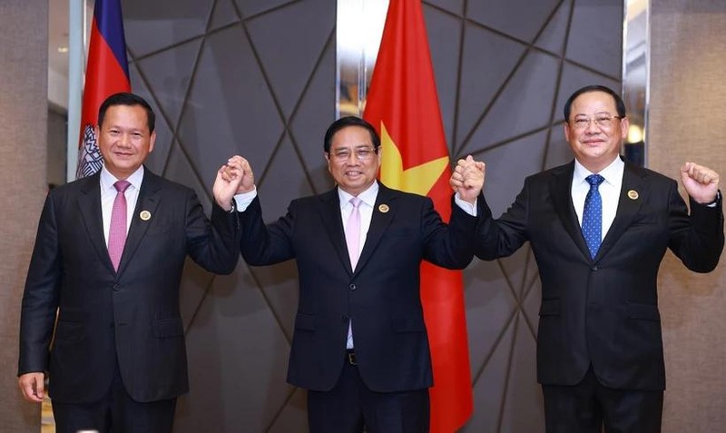 越南政府总理范明正、柬埔寨王国首相洪玛奈和老挝人民民主共和国总理宋赛·西潘敦。（图片来源：越通社）