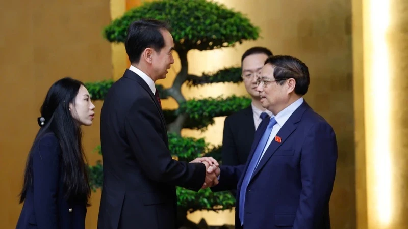越南政府总理范明正会见中国驻越南大使何炜