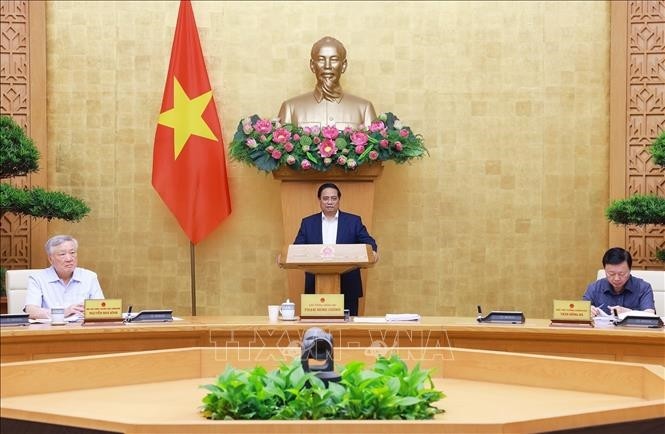 范明正总理发表总结讲话。（图片来源：越通社）