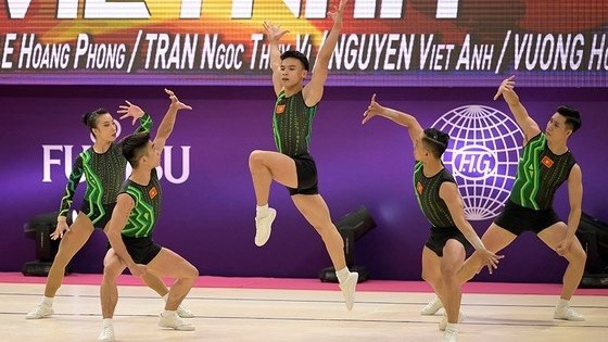 越南健美操队夺得2022年世界健美操锦标赛的金牌。（图片来源：dangcongsan.vn）