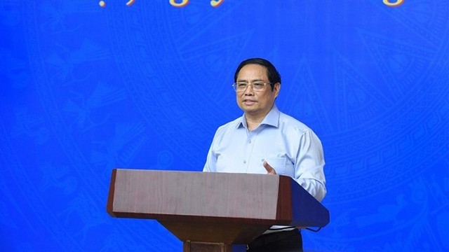 范明正总理在会议上发表讲话。（图片来源： 陈海 摄）