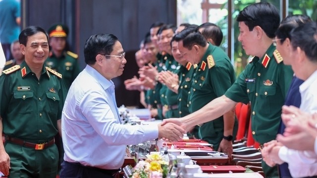 范明正总理和与会代表。（图片来源：VGP）