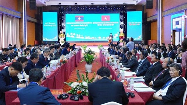 越南司法部与老挝司法部联合举行越老边境省份第五次司法扩大会议。（图片来源：越通社）