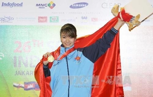 越南运动员阮梅芳在第26届东运会武术长拳比赛中以9.71分获得金牌。  (Photo: 图片来源：越通社)