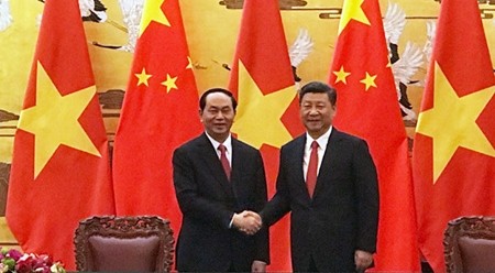 越南国家主席陈大光与中国国家主席习近平。