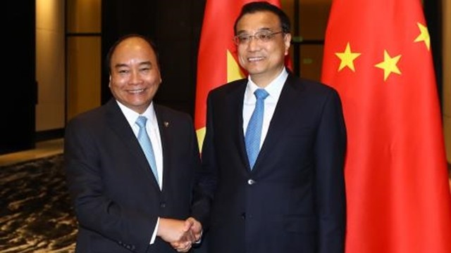 越南政府总理阮春福11月13日会见中国国务院总理李克强。 （图片来源：越通社）