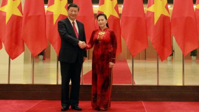 越南国会主席阮氏金银会见中共中央总书记、国家主席习近平。