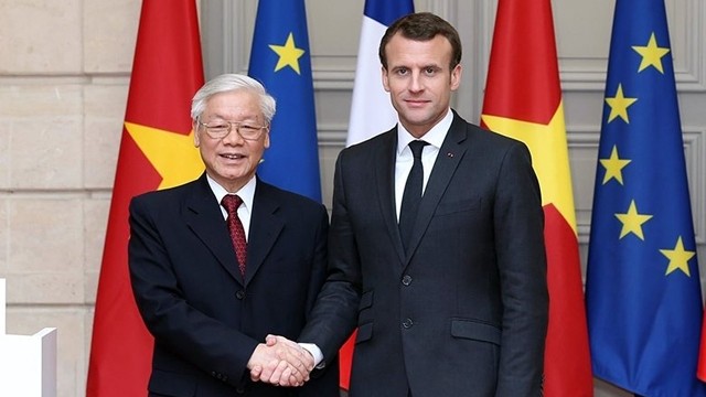 阮富仲总书记和法国总统埃马纽埃尔•马克龙。（图片来源：越通社）