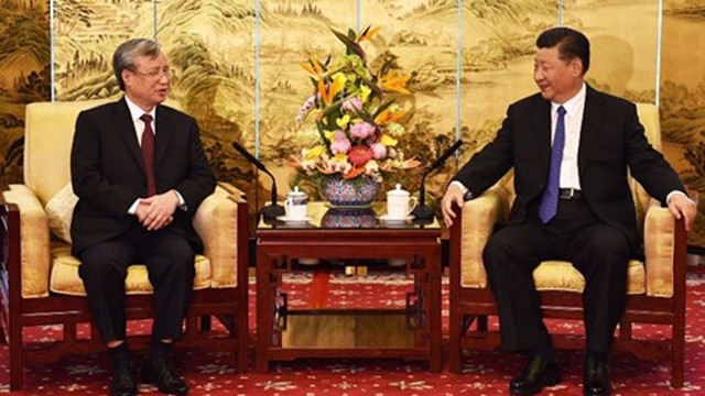中共中央总书记、中国国家主席习近平会见陈国旺同志。（图片来源：VOV)