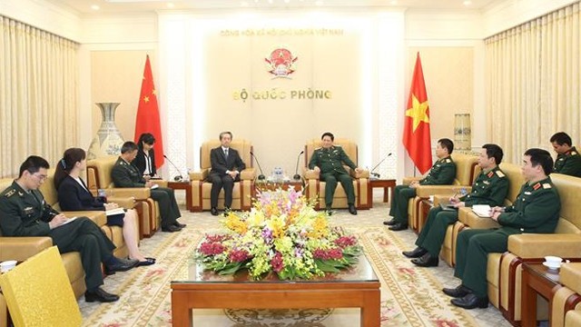吴春历部长会见中国驻越南大使熊波。