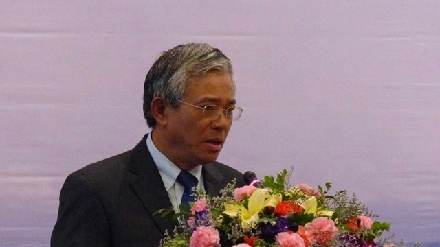 越南外交部副部长范光荣在会上致开幕词。