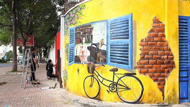 西原壁画街成为当地居民和游客的理想娱乐目的地。（图片来源：越通社）