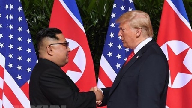 朝鲜领导人金正恩与美国总统特朗普。（图片来源：越通社）