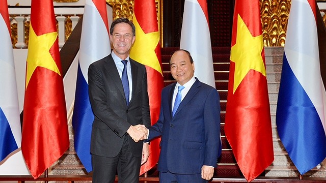 越南政府总理和荷兰王国首相马克•吕特。（陈海 摄）
