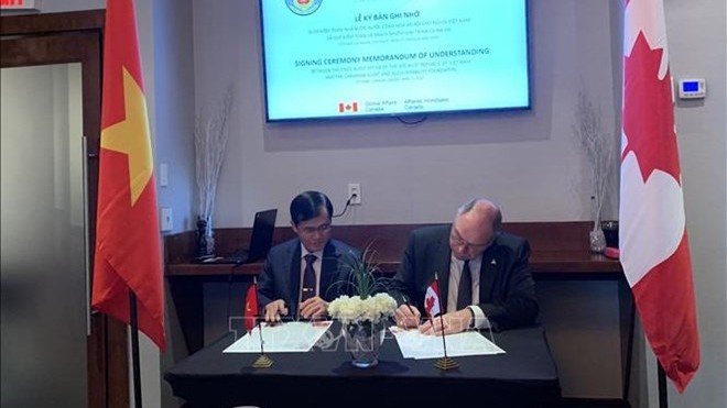 越南国家审计署和加拿大审计和问责基金会签署了合作备忘录。（图片来源：越通社）