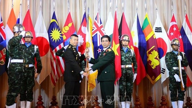黄金凤（右）少将接任2020年亚太维和训练中心联盟轮值主席国。