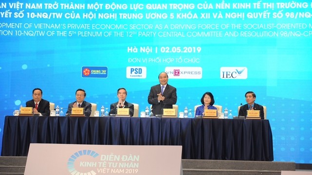 阮春福总理出席2019年私营经济论坛全体会议。（图片来源：陈海 摄）