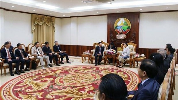 越老友好协会代表团会见老挝国会主席巴妮•雅陶都。（图片来源：宣教报）