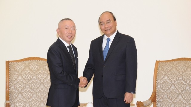 越南政府总理阮春福会见日本迅销集团总裁柳井正。(陈海 摄）