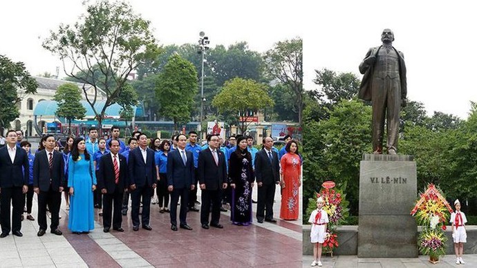 河内市领导向列宁塑像敬献花圈。（图片来源：越南法律报）