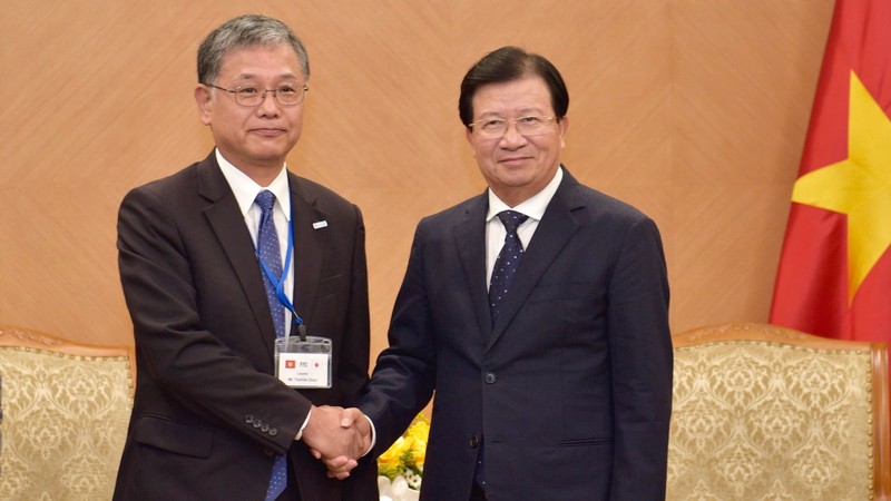 郑廷勇副总理和日本人民外交促进会副主席Onoi Yoshiki。（图片来源：VGP）