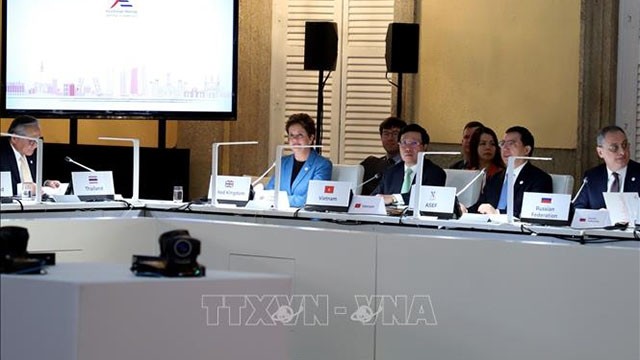 出席会议的越南政府副总理兼外交部长范平明。（图片来源：越通社）
