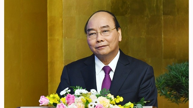 越南政府总理阮春福发表讲话。（陈海 摄）