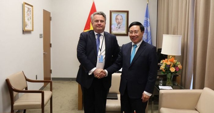 越南政府副总理兼外交部部长范平明和乌克兰外交部副部长瑟吉。
