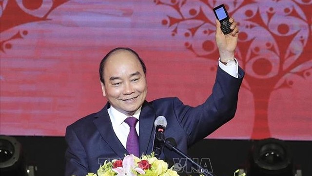 越南政府总理阮春福出席2020庚子新春人道主义力量活动。（图片来源：越通社）