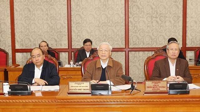 越共中央总书记、国家主席阮富仲3月20日主持召开的防疫工作会议。（图片来源：越通社）