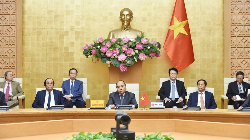 越南政府总理阮春福出席二十国集团领导人应对新冠肺炎特别视频峰会。（陈海 摄）