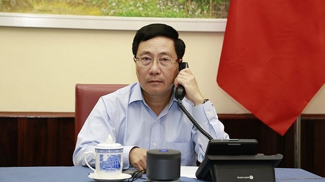 越南政府副总理兼外交部长范平明。（图片来源：世界与越南报）
