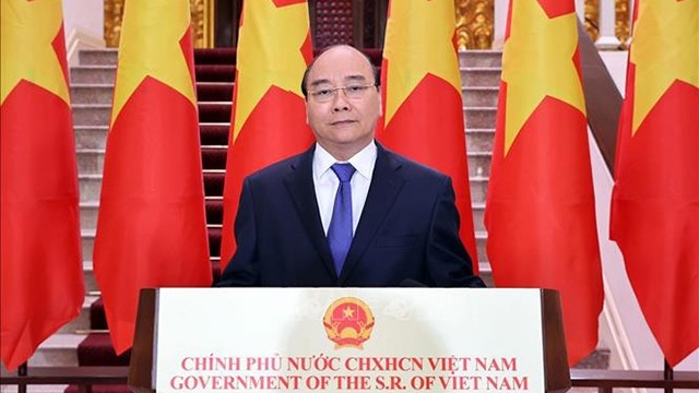 越南政府总理阮春福在开幕式上发表视频致辞。