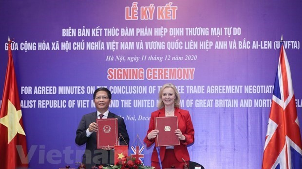 结束《越南与英国自由贸易协定》谈判的备忘录签字仪式。（图片来源：越通社）