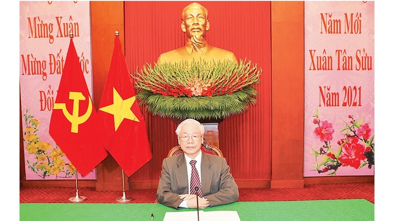 越共中央总书记、国家主席阮富仲与中共中央总书记、国家主席习近平通电话。（图片来源：越通社）