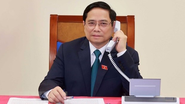 老挝总理与越南新任政府总理范明正通电话表示祝贺。（图片来源：越通社）