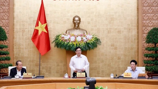 越南政府总理范明正在会上致开幕词。（图片来源：越通社）