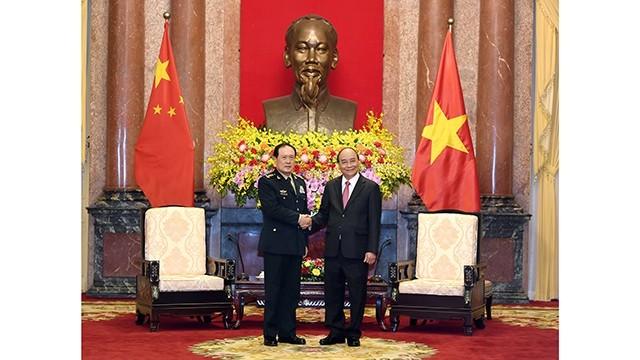 越南国家主席阮春福会见中国国防部部长魏凤和。（维灵 摄）