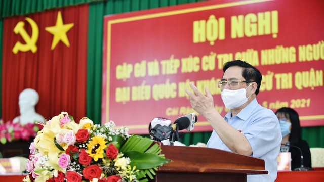 越南政府总理范明正发表讲话 。