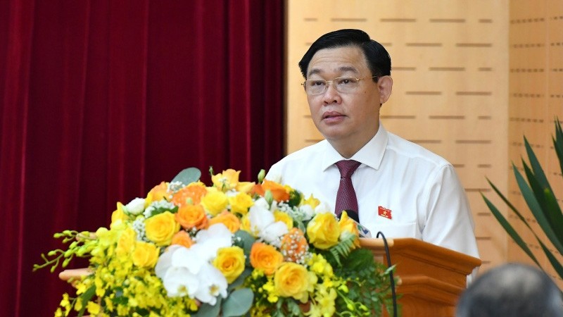 国会主席王廷惠在会上发表讲话。（维玲 摄）
