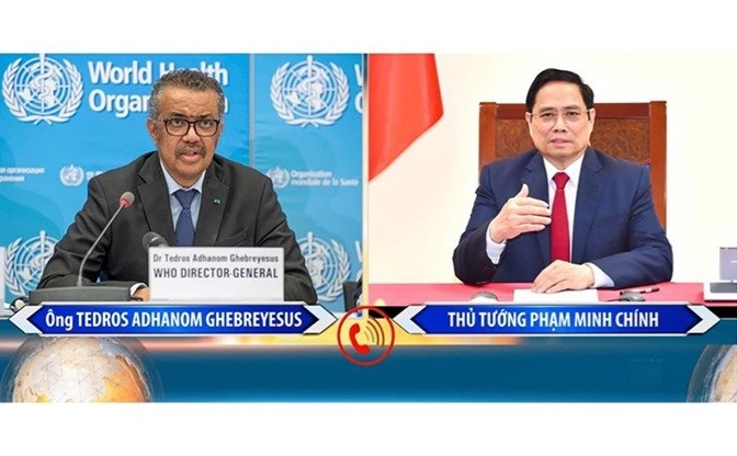 越南政府总理范明正与世界卫生组织总干事谭德塞通电话。