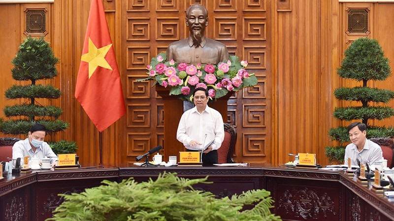 政府总理范明正主持关于健全国家新冠肺炎疫情防控指导委员会会议。（陈海 摄）
