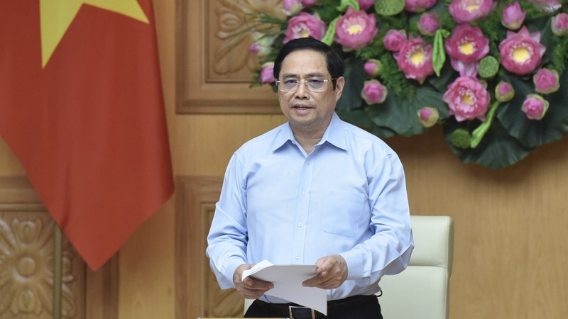 越南政府总理范明正发表讲话。（陈海）