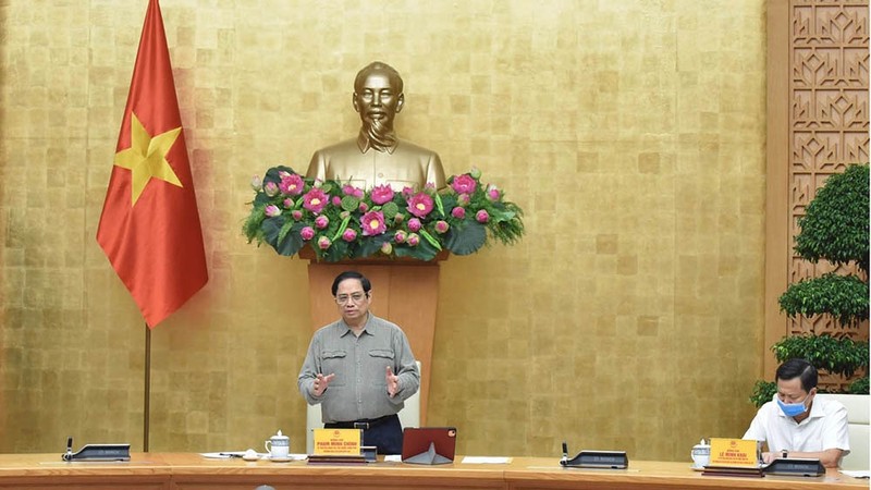 政府总理范明正主持新冠肺炎疫情防控会议。