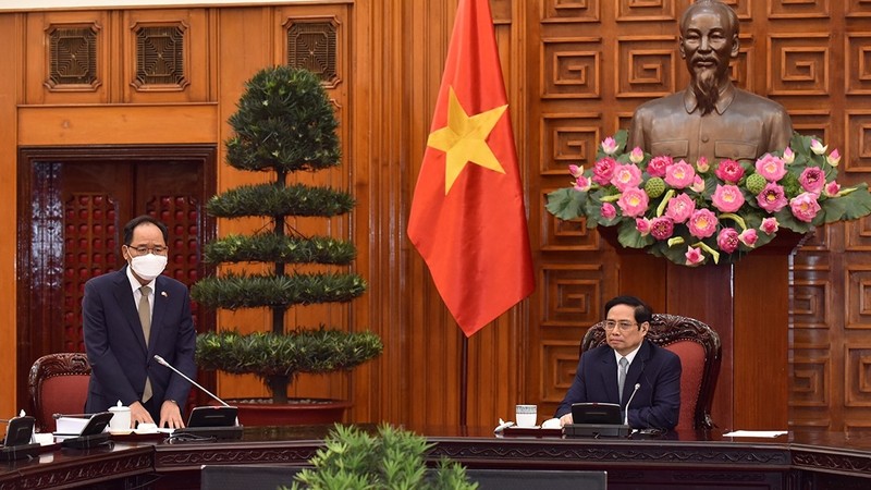 政府总理范明正会见韩国驻越大使朴能运。（陈海 摄）