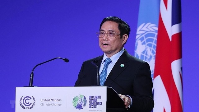 越南政府总理范明正在《联合国气候变化框架公约》第二十六次缔约方大会（COP26）上发表讲话。