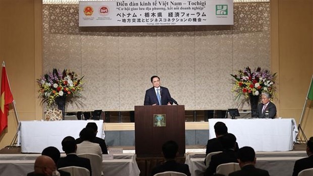 范明正总理出席在栃木县举行的越日地方合作会议。（图片来源：越通社）
